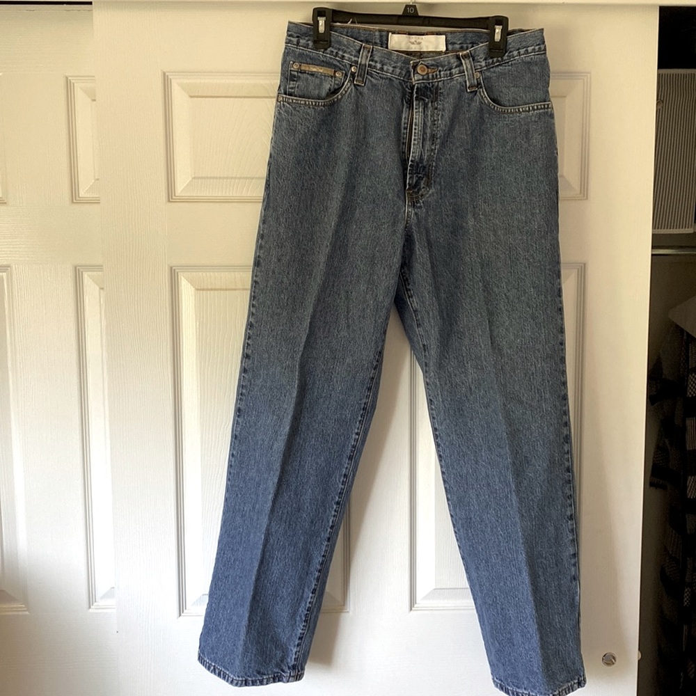 Men’s faded blue jeans.